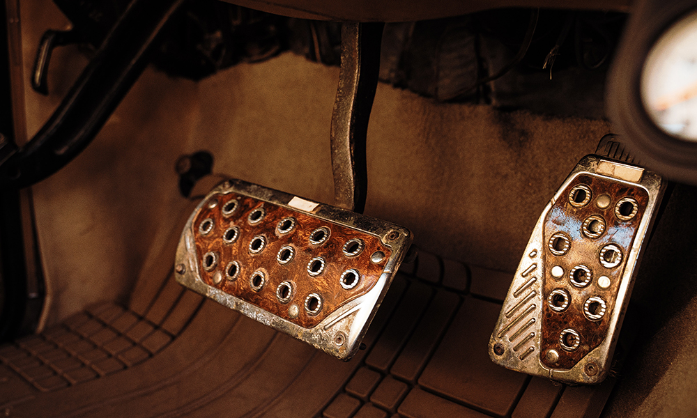 The custom gas and brake pedals inside the 1982 Jeep Wagoneer Limited.