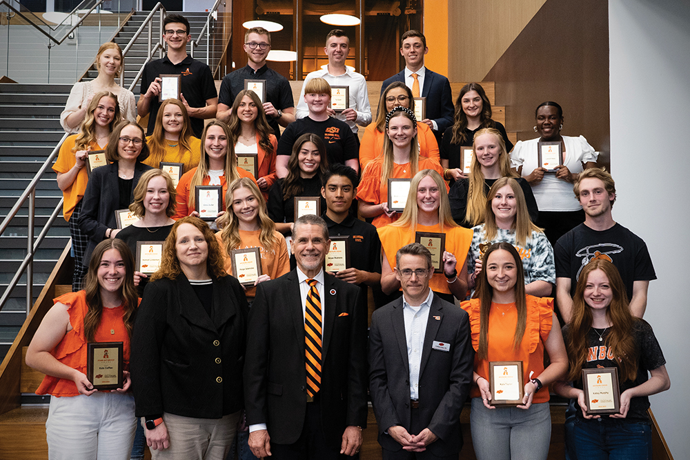 Pedersen with CEHS student award winners