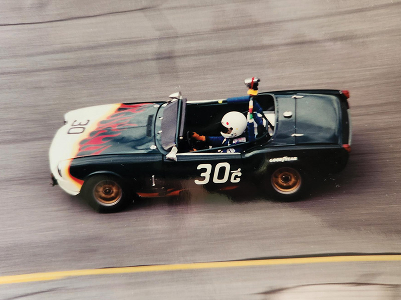 An aerial shot of a black racecar